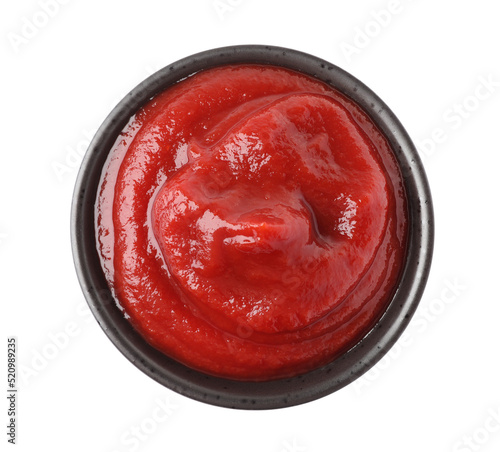 Tasty ketchup in bowl isolated on white, top view