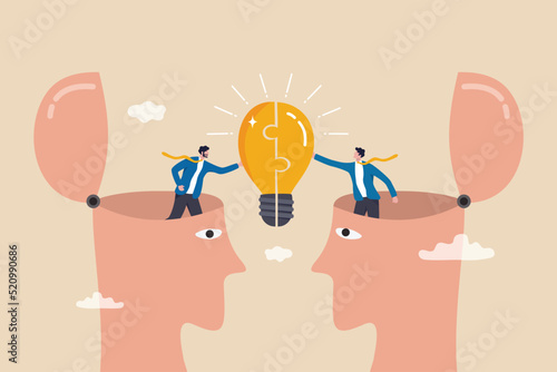 Understanding lead to success, agreement or think together to find solution to solve problem, insight or team communication concept, businessmen partner open their head to connect lightbulb jigsaw.
