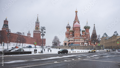 December 5, 202, Moscow, Russia. View of Vasilyevsky Spusk, the Moscow Kremlin and St. Basil's Cathedral in winter during a snowfall. photo