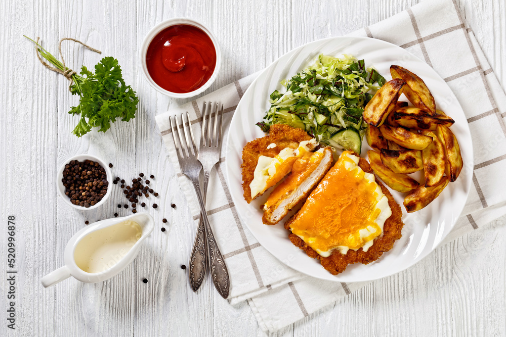 chicken parmo with coleslaw and roast potatoes chicken parmo with coleslaw and roast potatoes