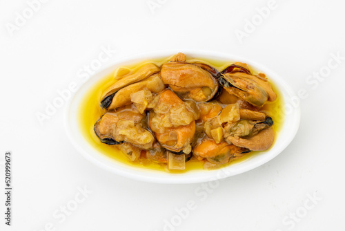 Canned mussels on ceramic tray