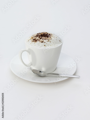 Coffee with milk in porcelain coffee cup