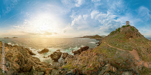 Aerial sunset view panorama of Punta Parata of Ajaccio town by the Sanguinaires islands. Parata tower in Corsica island of France. Ancient Genoese tower in Corsica sea and Mediterranean sea photo