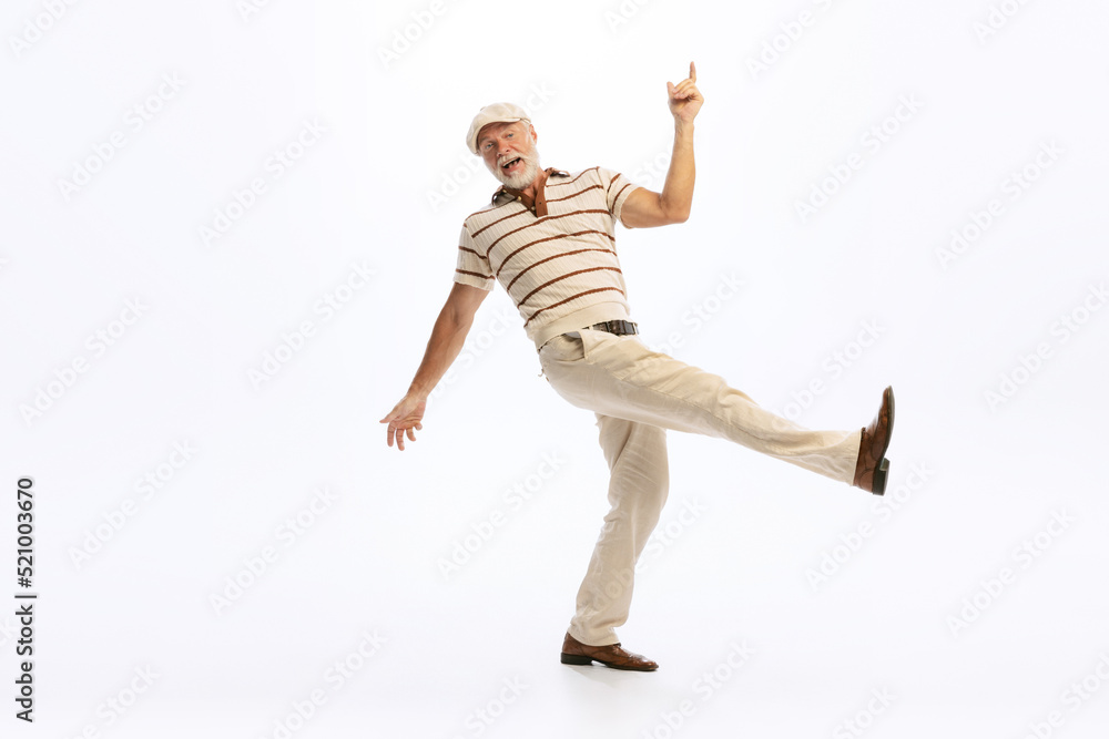 Portrait of happy senior man in retro style clothes, vintage outfit posing isolated on white background. Concept of culture, art, music, fashion style, ad Portrait of happy senior man in retro style clothes, vintage outfit posing isolated on white background. Concept of culture, art, music, fashion style, ad