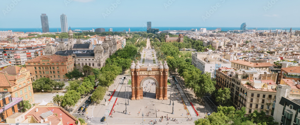 Obraz na płótnie Aerial view of Barcelona Urban Skyline and The Arc de Triomf or Arco de Triunfo in spanish, a triumphal arch in the city of Barcelona. Sunny day. w salonie