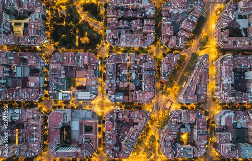 Photography Barcelona overhead shot of typical city blocks in beautiful sunlight with urban traffic