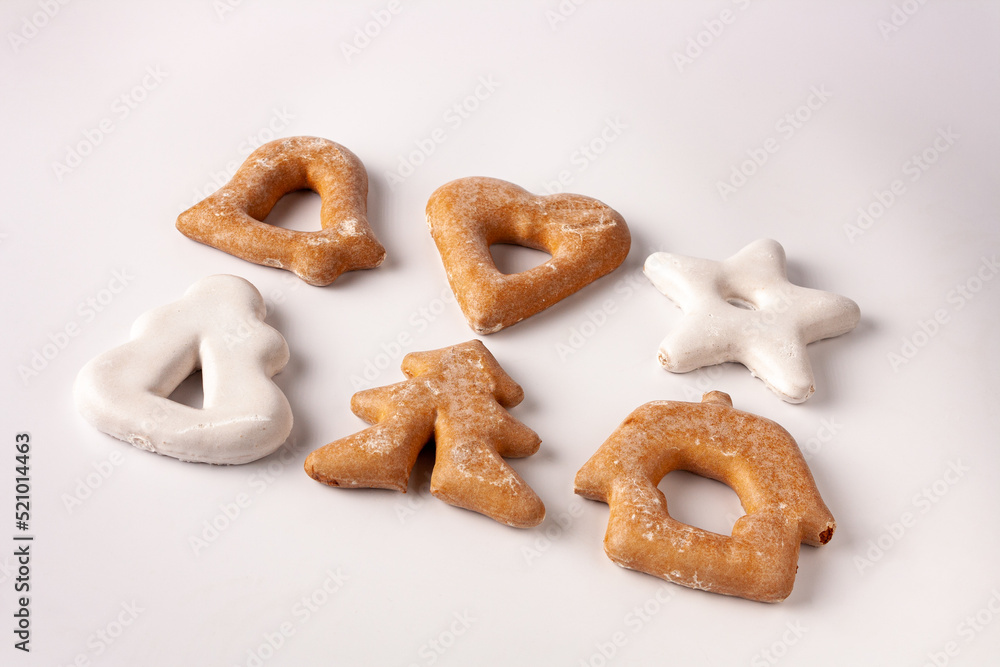 gingerbread cookies in sugar glaze lie on a white background