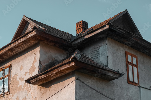 The mystical roof of the house captured in fine art style, teal and orange color