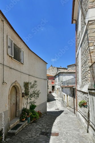 Fototapeta Naklejka Na Ścianę i Meble -  A small street between the old houses of Zungoli, one of the most beautiful villages in Italy.