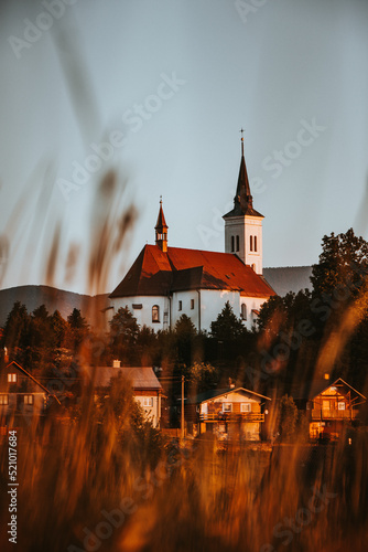 Church of St. Ignatius of Loyola at Borová in Malenovice at sunset in Beskydy mountains, Czech republic. Christian church for its faithful photo