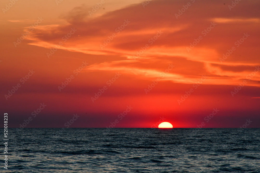 sunset in the sea, Fire in the sky