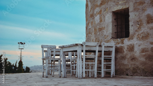 tables and chairs in aegean geography