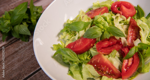 Wallpaper Mural Green vegan salad, tomato and basilic from green leaves mix and vegetables, High quality photo Torontodigital.ca