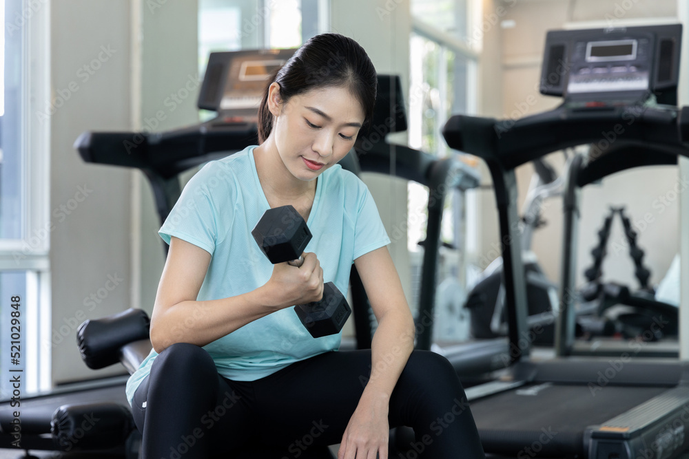 Beautiful And Shapely Asian Woman Working Out In The Gym Play Exercise beautiful-and-shapely-asian-woman-working-out-in-the-gym-play-exercise