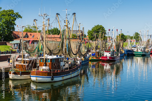 Fischerboote im Hafen von Greetsiel; Ostfriesland; Deutschland photo