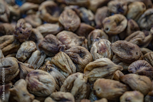 Dry figs seen in drying process.