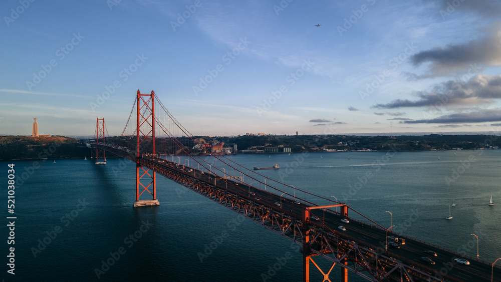 Fototapeta premium 25 Abril Bridge in Lisbon at sunset