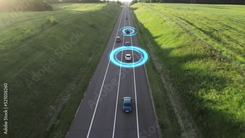 Electric cars with HUD-elements drive along the highway and scan the road environment with sensors. Concept of smart roads, self-driving vehicles, transport of the future. Speed and identity control. photo