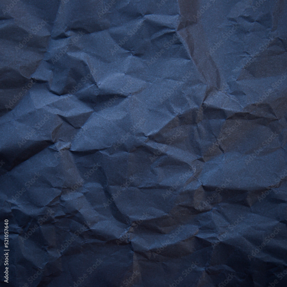 Textured crumpled black paper background. Textured crumpled black paper background.