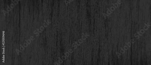 Old and dusty black wood texture, scratched and grainy black grunge texture with stains, stylist and luxury black background for wallpaper, cover, card and design.