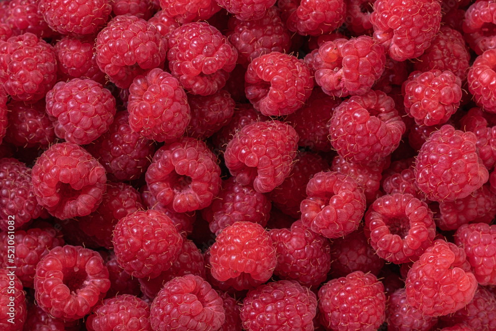 Raspberry. Fresh organic berries with leaves macro. Fruit background. Background from fresh raspberrys, close up. Top view, Flat lay, free space Raspberry. Fresh organic berries with leaves macro. Fruit background. Background from fresh raspberrys, close up. Top view, Flat lay, free space