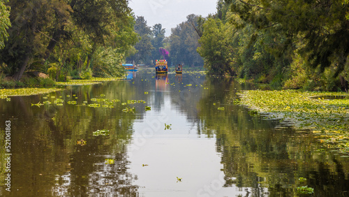 Trajinera in Xochimilco canal southern Mexico City photo