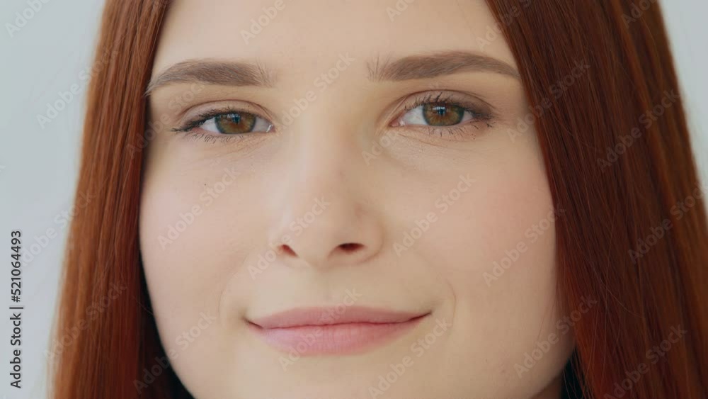 Portrait gorgeous beautiful red-haired young girl with flawless perfect face skin natural day makeup expressing friendly emotion good eyesight. Close up female body part of caucasian 20s student model Portrait gorgeous beautiful red-haired young girl with flawless perfect face skin natural day makeup expressing friendly emotion good eyesight. Close up female body part of caucasian 20s student model