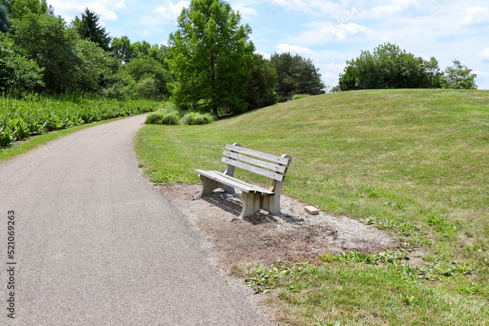 The empty wood park bench in the countryside. The empty wood park bench in the countryside.