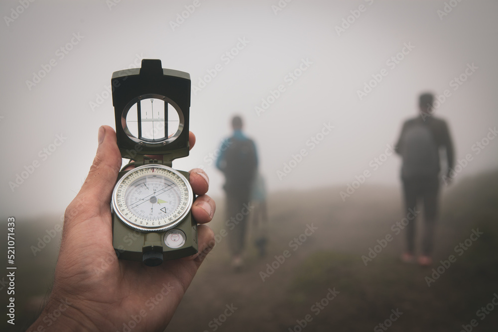 compass in hand find way destination