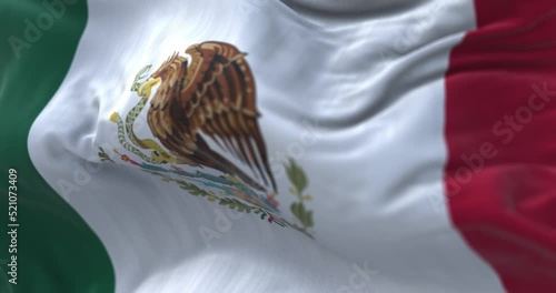 Close-up view of the mexican national flag waving in the wind photo