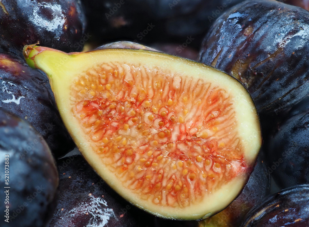 Fig berry cut in half. Close-up. Fig berry cut in half. Close-up.