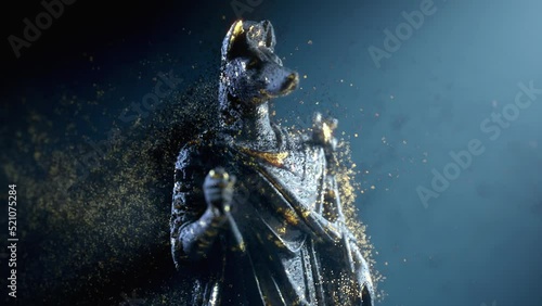 3D graphics of a statue of a mythological god Hermanubis combining the appearance of Hermes and Anubis on a dark background, slowly rotating and disintegrating into black and gold particles. animation photo