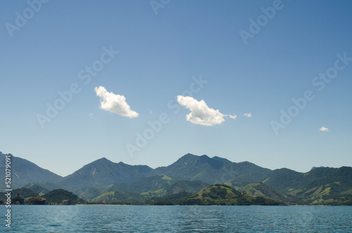 Sea and mountains at the coast of Angra dos Reis town, State of Rio de Janeiro, Brazil. Taken with Nikon D5100 18-55mm lens, at 34mm, 1/400 f 10.0 ISO 100. photo