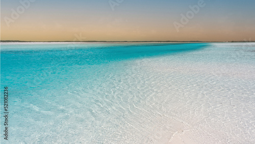 Perfect sandy beach with crystal clear waters and sand bars. Sea view from tropical beach. Travel concept.