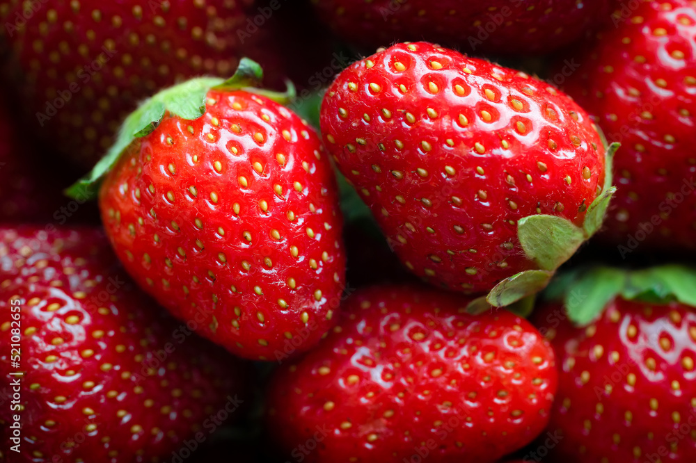 Ripe harvest of organic strawberries close-up. View from above Ripe harvest of organic strawberries close-up. View from above