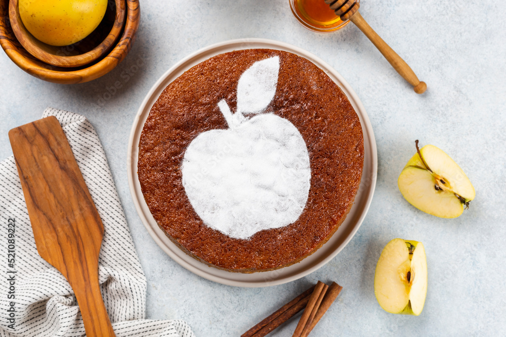 Homemade apple pie on a white wooden background, top view. The classic autumn dessert for Thanksgiving is organic apple pie. Homemade apple pie on a white wooden background, top view. The classic autumn dessert for Thanksgiving is organic apple pie.