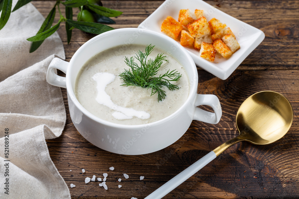 mushroom soup in a white bowl, view from above. copy space mushroom soup in a white bowl, view from above. copy space