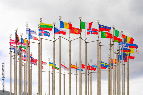 A sporting event, the flags of all countries fluttering in the wind on the standards photo