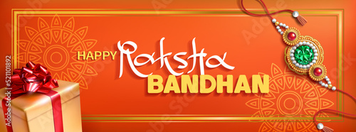 Fotografia Greeting banner with rakhi (bracelet) and gift for Raksha Bandhan (Bond of protection and care) – Indian festival of sisters and brothers