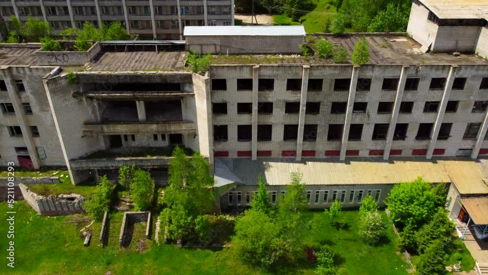 Abandoned dilapidated sanatorium building. Sanatorium Kuldur near the urban-type settlement Kuldur in the Jewish Autonomous Region. The Russian Far East. Abandoned dilapidated sanatorium building. Sanatorium Kuldur near the urban-type settlement Kuldur in the Jewish Autonomous Region. The Russian Far East.