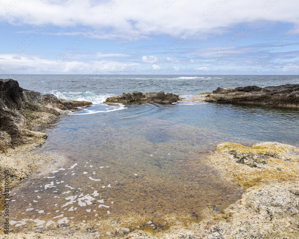 Natural sea pool on the beach taken on the island of Sao Miguel, Azores, Portugal Natural sea pool on the beach taken on the island of Sao Miguel, Azores, Portugal