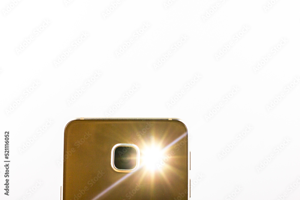 Smartphone LED.Flashlight turned on on the smartphone. Bright LED flashlight on the phone. Smartphone LED.Flashlight turned on on the smartphone. Bright LED flashlight on the phone.