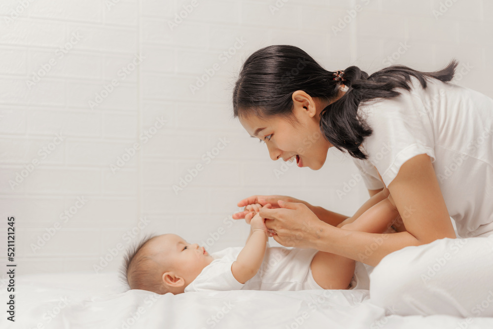Young asian mom and sweet baby daughter, Health care family love together. Asia mother's day concept. Young asian mom and sweet baby daughter, Health care family love together. Asia mother's day concept.