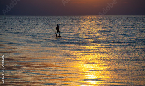 stand up paddle board sunset 
