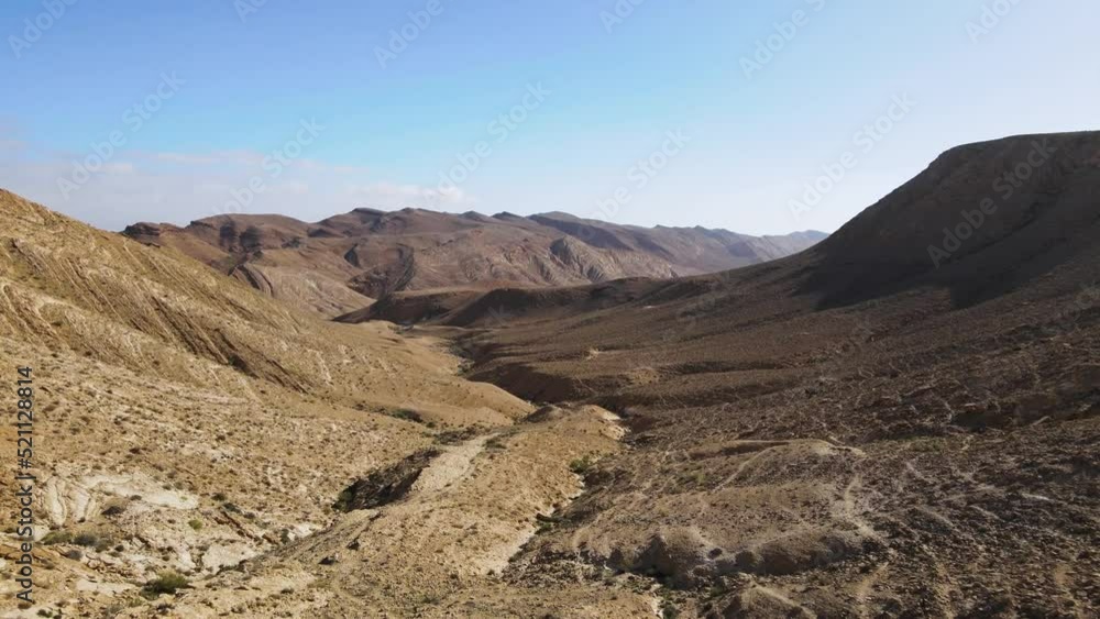 A time lapse shot of national geological park. Ramon Crater is the largest crater- geological erosion land form in Israel A time lapse shot of national geological park. Ramon Crater is the largest crater- geological erosion land form in Israel