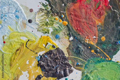 Abstract colorful texture background. Splash acrylic color on wood door.