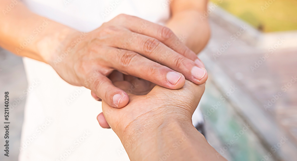 Close up of Man hand as Lending a helping hand as trust together with compassion concept Close up of Man hand as Lending a helping hand as trust together with compassion concept