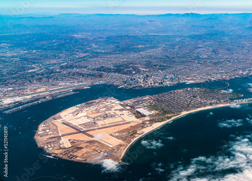 Aerial view of Coronado Island and San Diego downtown and San Diego East County mountains