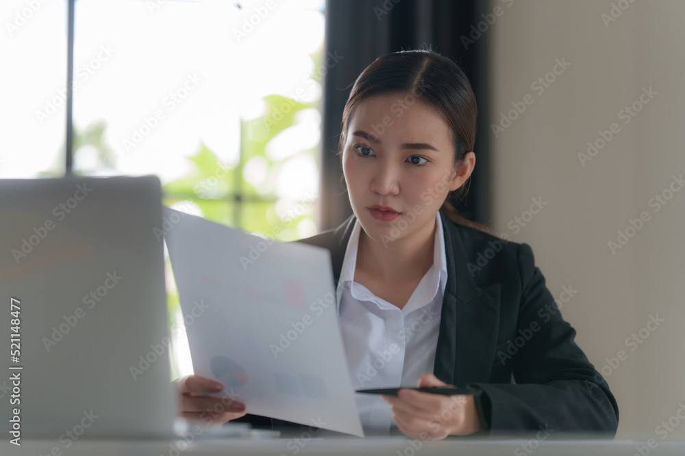 Fund investment concept. Stressed Business woman using finance application Fund investment concept. Stressed Business woman using finance application