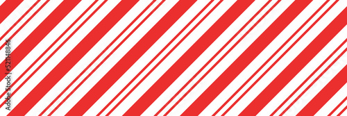 Christmas candy cane striped seamless pattern. Christmas candycane background with red stripes. Caramel diagonal print. Xmas traditional wrapping texture. Vector illustration.